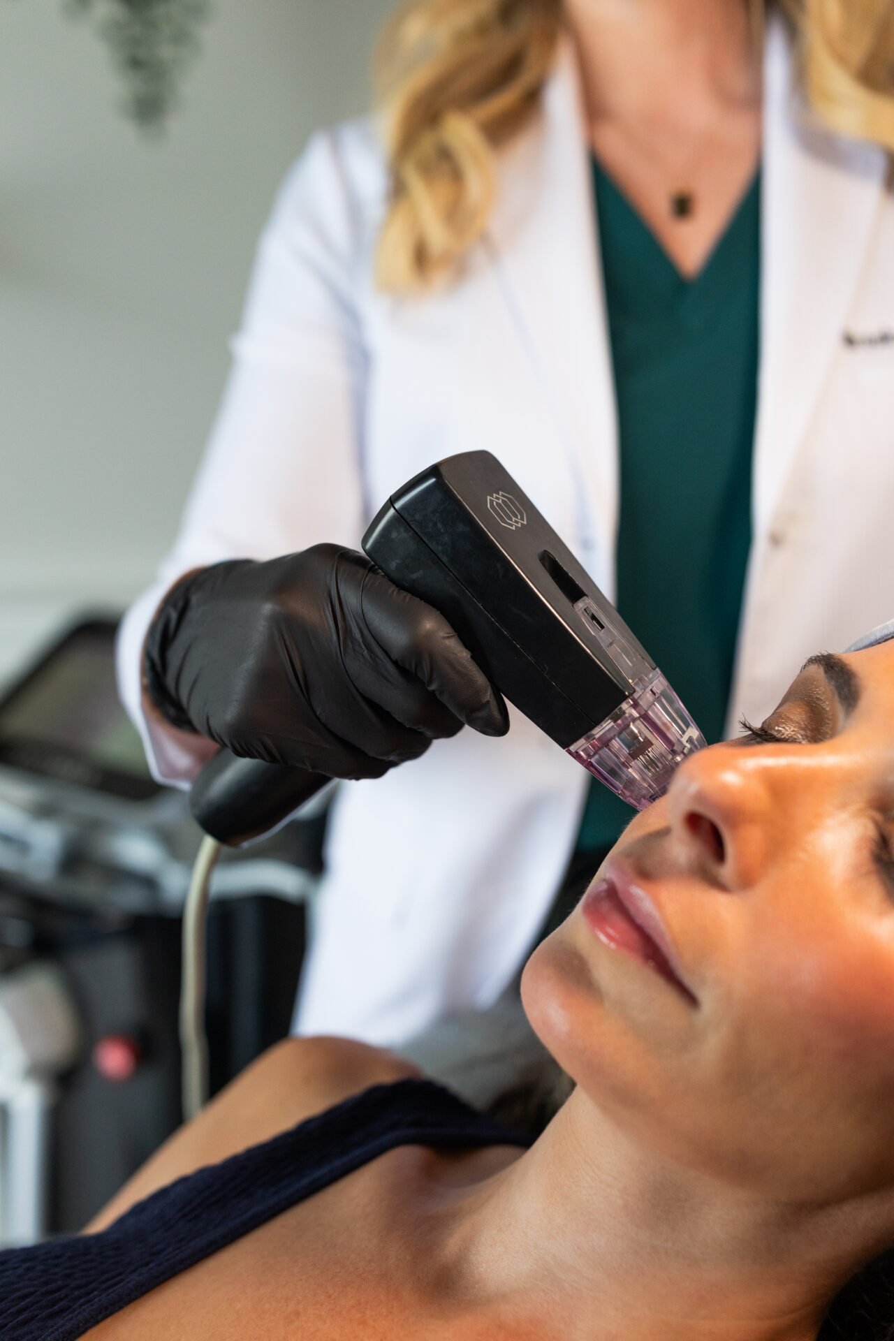 Benefits of Morpheus8 Radiofrequency Provider performing Morpheus8 radiofrequency microneedling on a patient's face