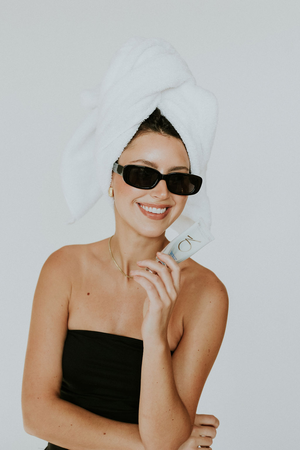 Teen Facial Deep Cleansing Treatment A skincare professional cleansing a teen's face during a facial treatment
