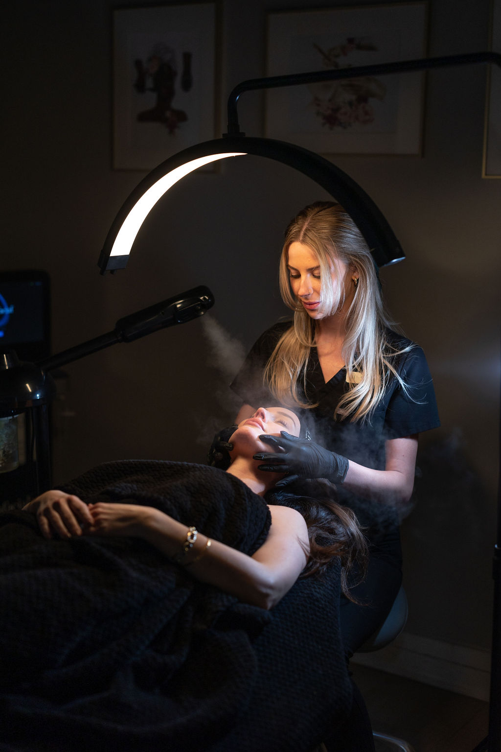 What to expect during the Dermaplane Facial Client receiving a Dermaplane facial at Hue Aesthetics in Louisville, KY, and Bellevue, OH, for smooth, glowing skin.