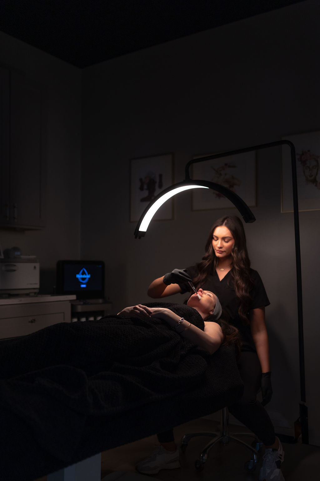 The Dermaplane Express 3 Client enjoying a Dermaplane Express treatment at Hue Aesthetics in Louisville, KY, and Bellevue, OH, for smoother, brighter skin.